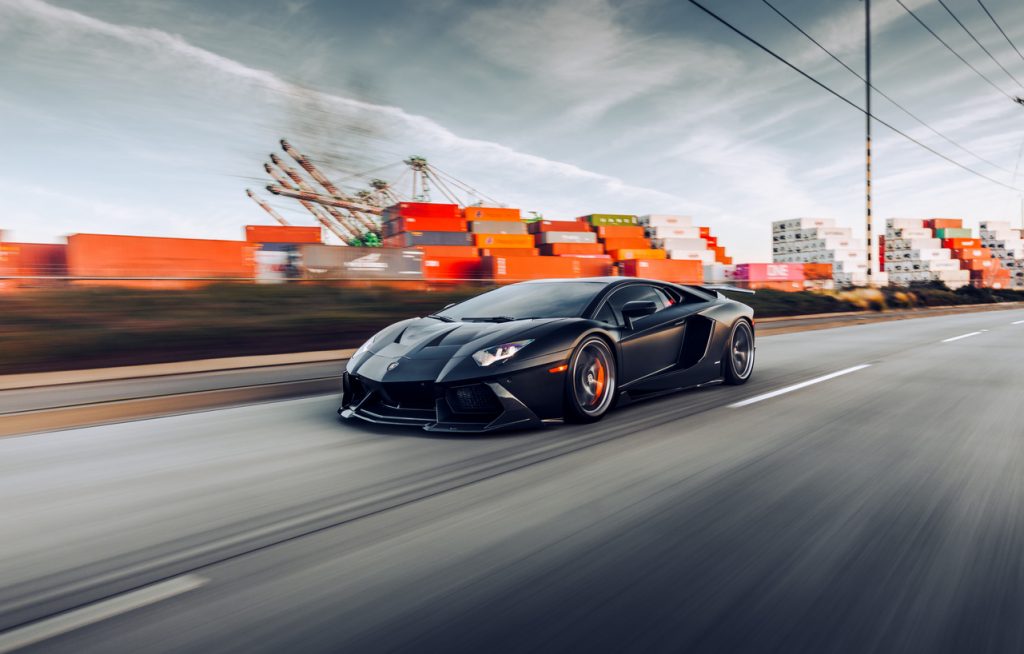 Black Lamborghini on road