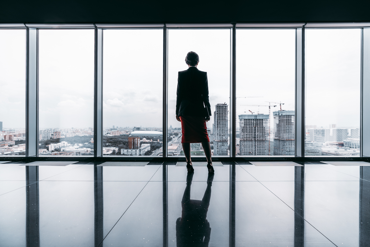A silhouette of a businesswoman