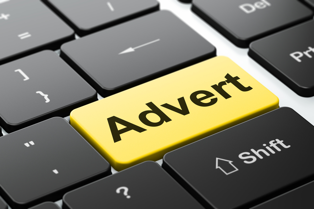 Marketing concept: Advert on computer keyboard background