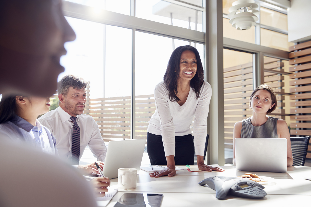Female leader in business meeting