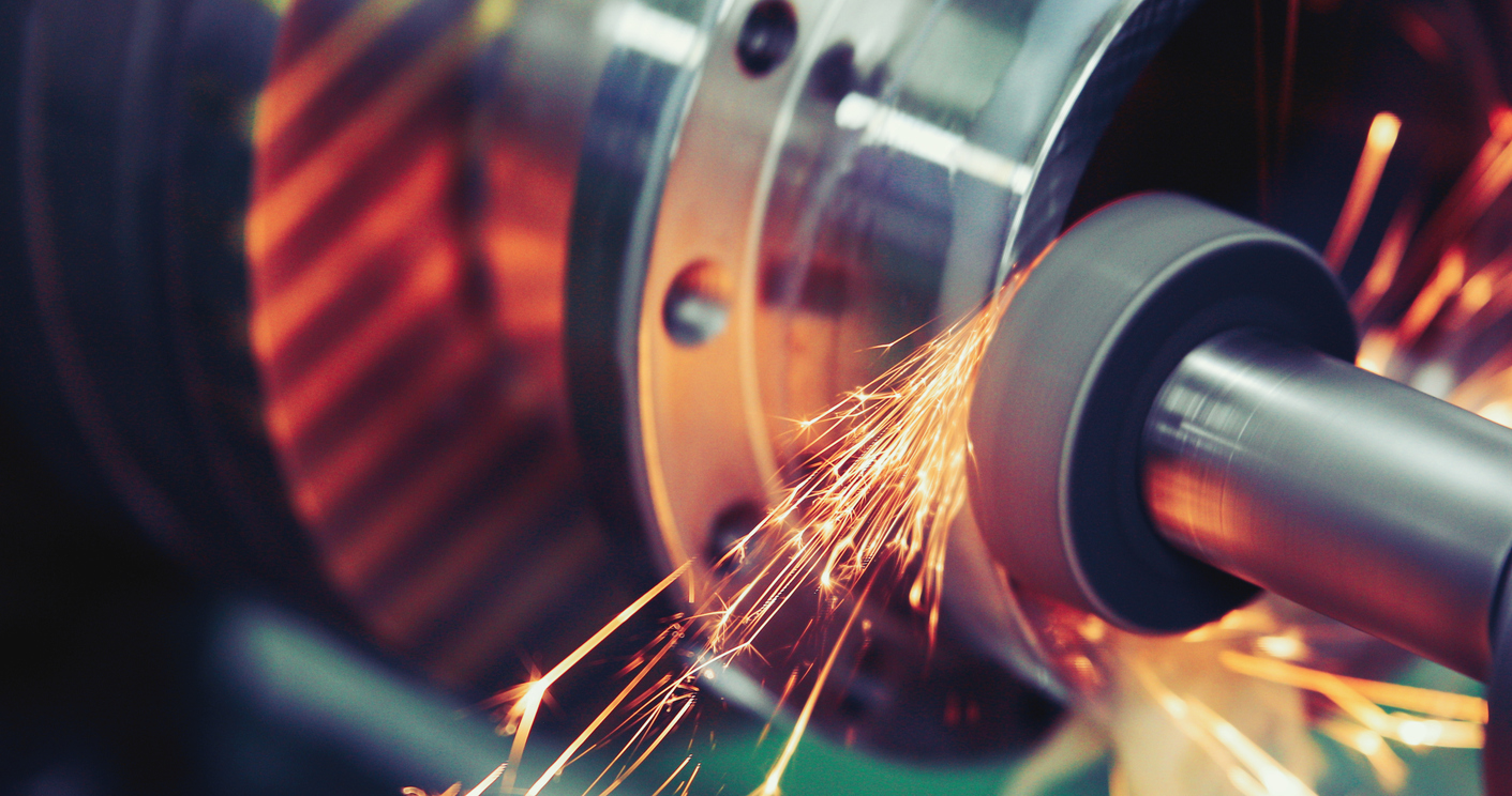 Finishing metal working on high precision grinding machine in factory