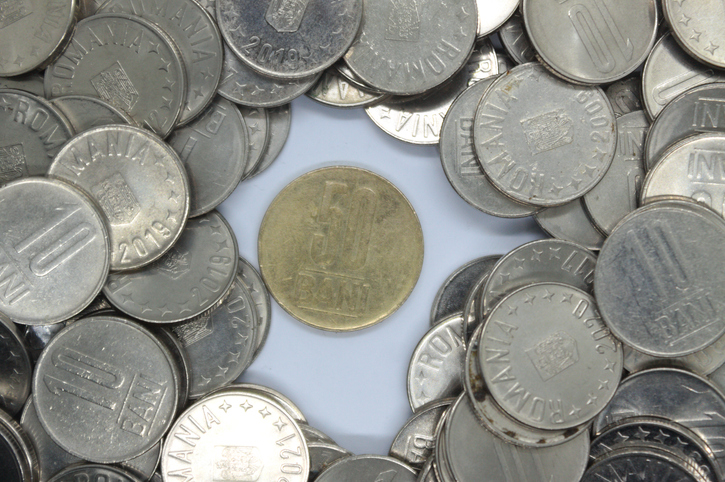 closeup of romanian currency coin of 50 bani and 10 bani stack