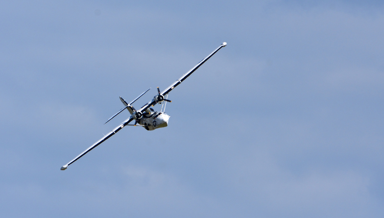 vintage pby 5a catalina “miss pick up” (g pbya) flying boat in flight.