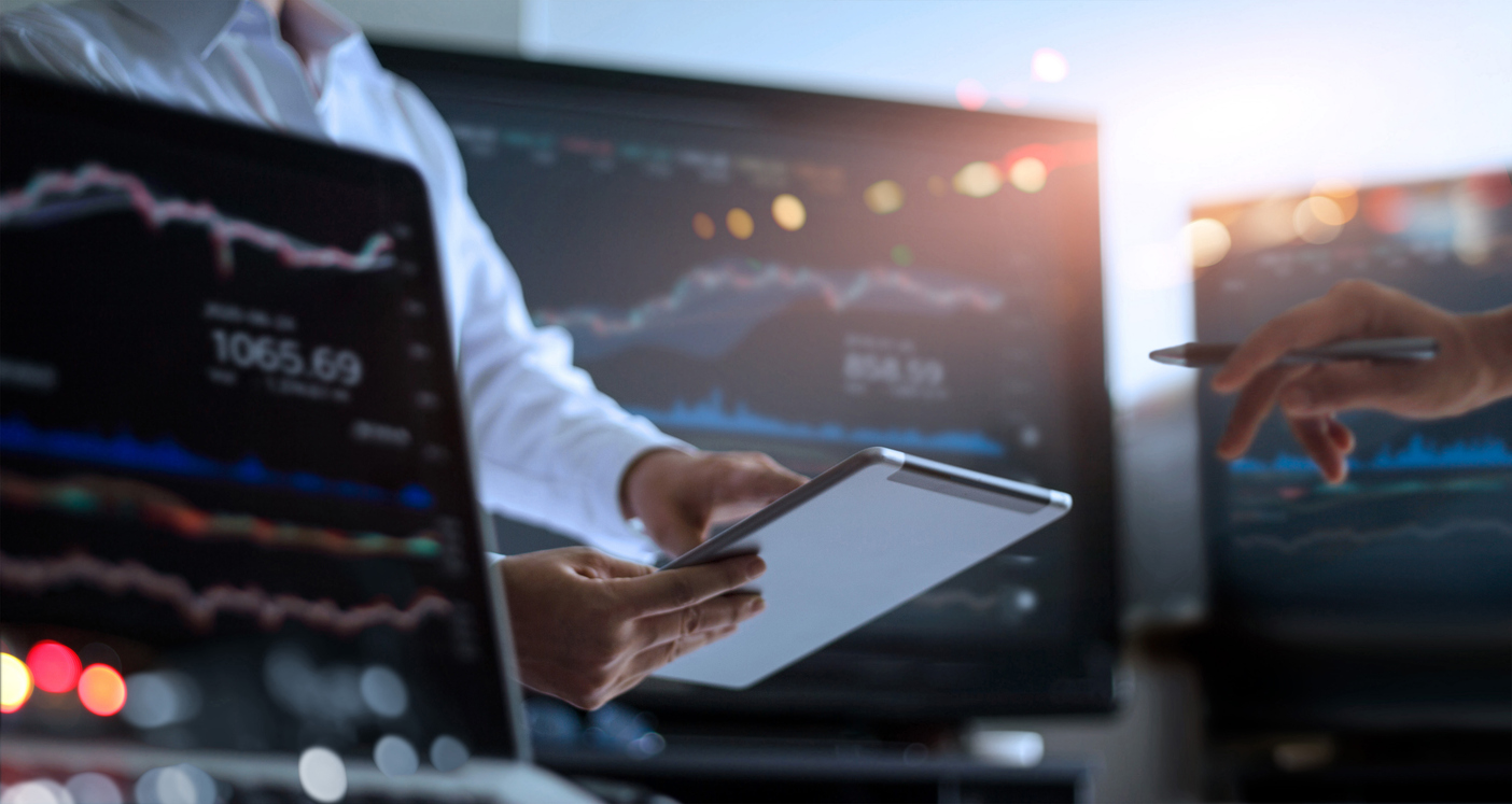 business team working together. businessman using tablet for analyzing data stock market in monitoring room with team pointing on the data presented in the chart on screen, forex trading graph, stock exchange trading online, financial investment concept.