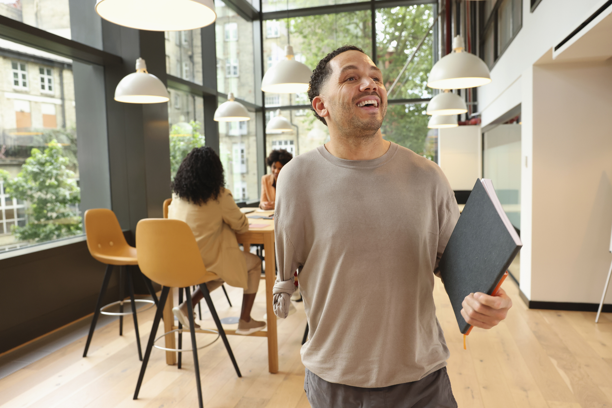 disabled businessman walking through office