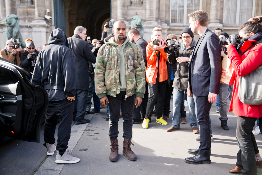paris march,4,,2015.,kanye,west,posing,for,photographers,in,front