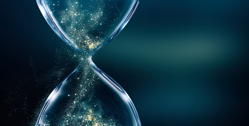 glass hourglass with glowing sand
