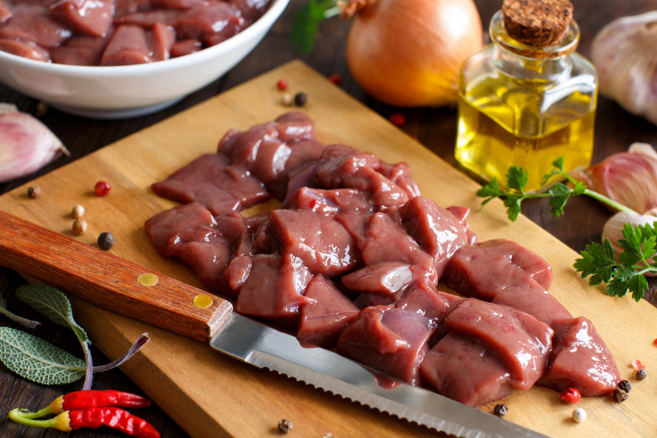 raw beef liver with spices, herbs and vegetables