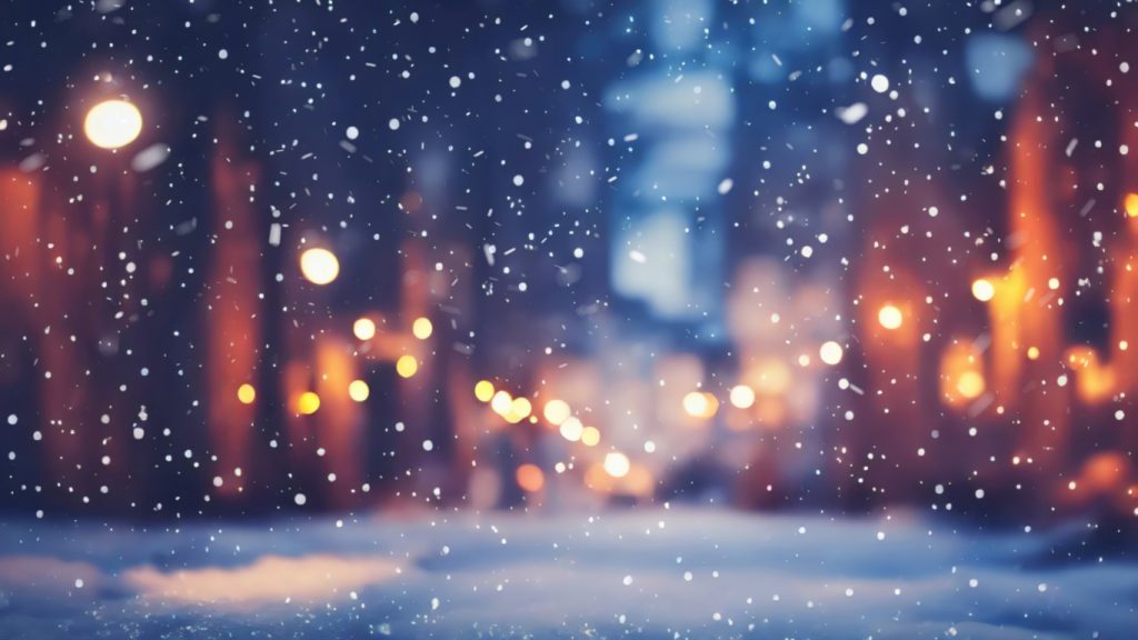 beautiful background image of a city square on a winter evening with a light snowfall.