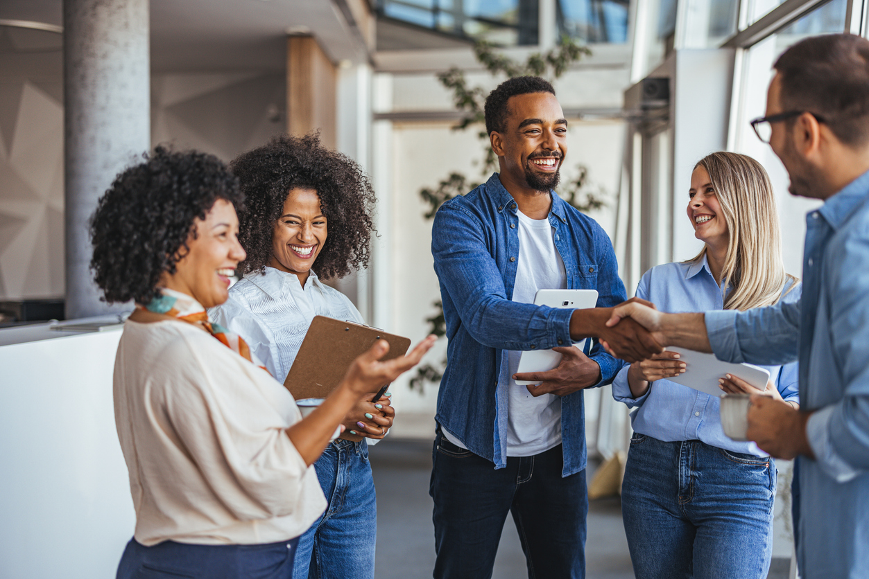 diverse team meeting in modern office space