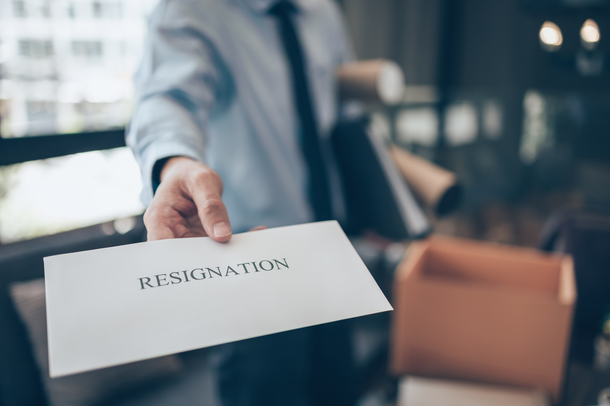 businessman sending and showing resignation letter to employer boss. quiting a job, businessman fired or leave a job concpet.