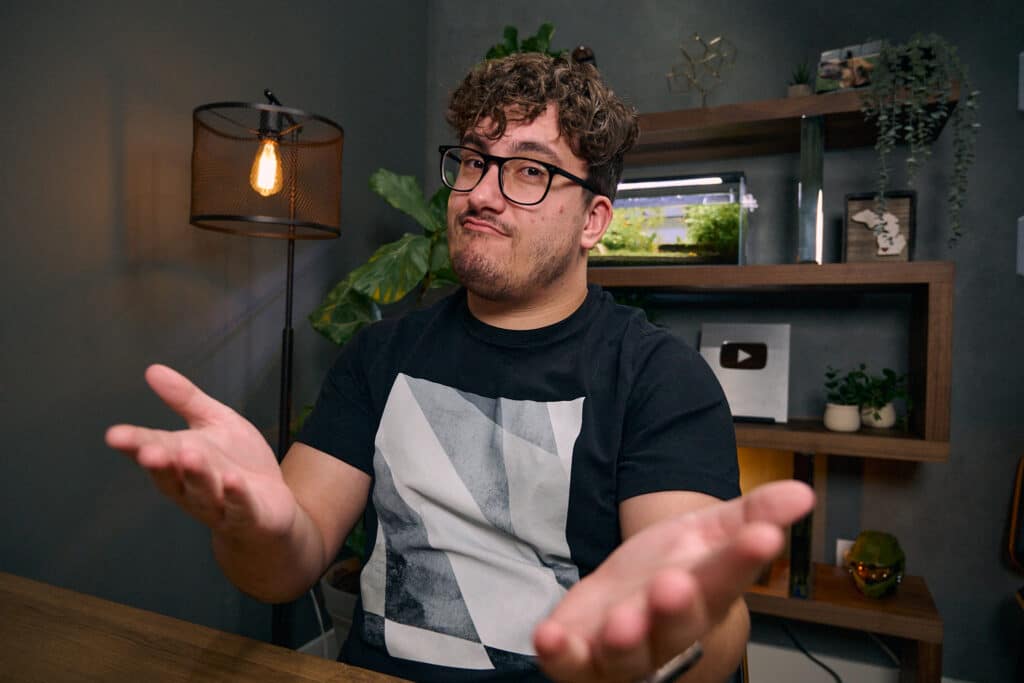 Caleb Hammer speaking on his YouTube show Financial Audit, where he reviews real people’s finances and offers practical debt advice.