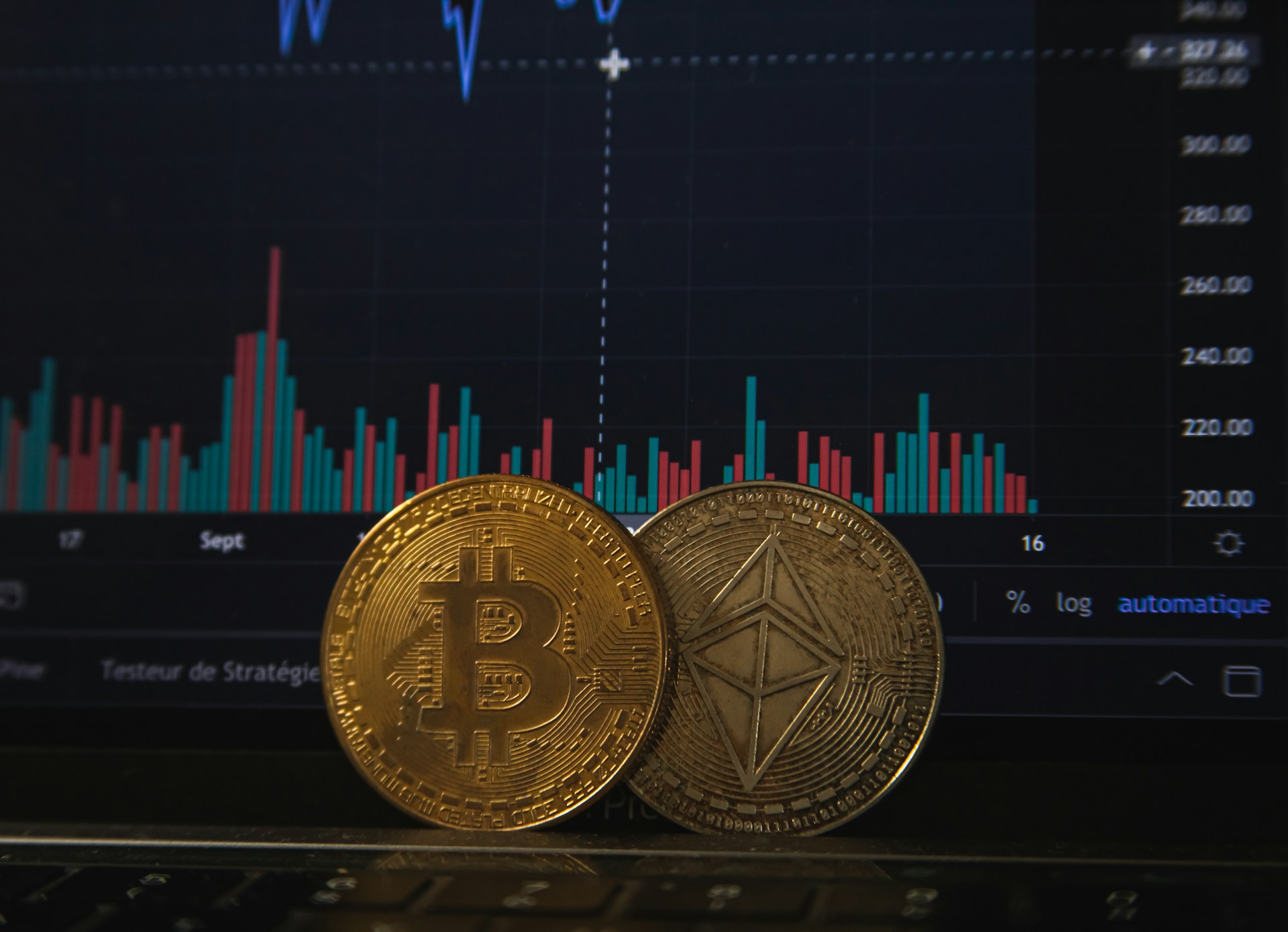two crypto coins with a background image of a chart showing the ups and downs of investing