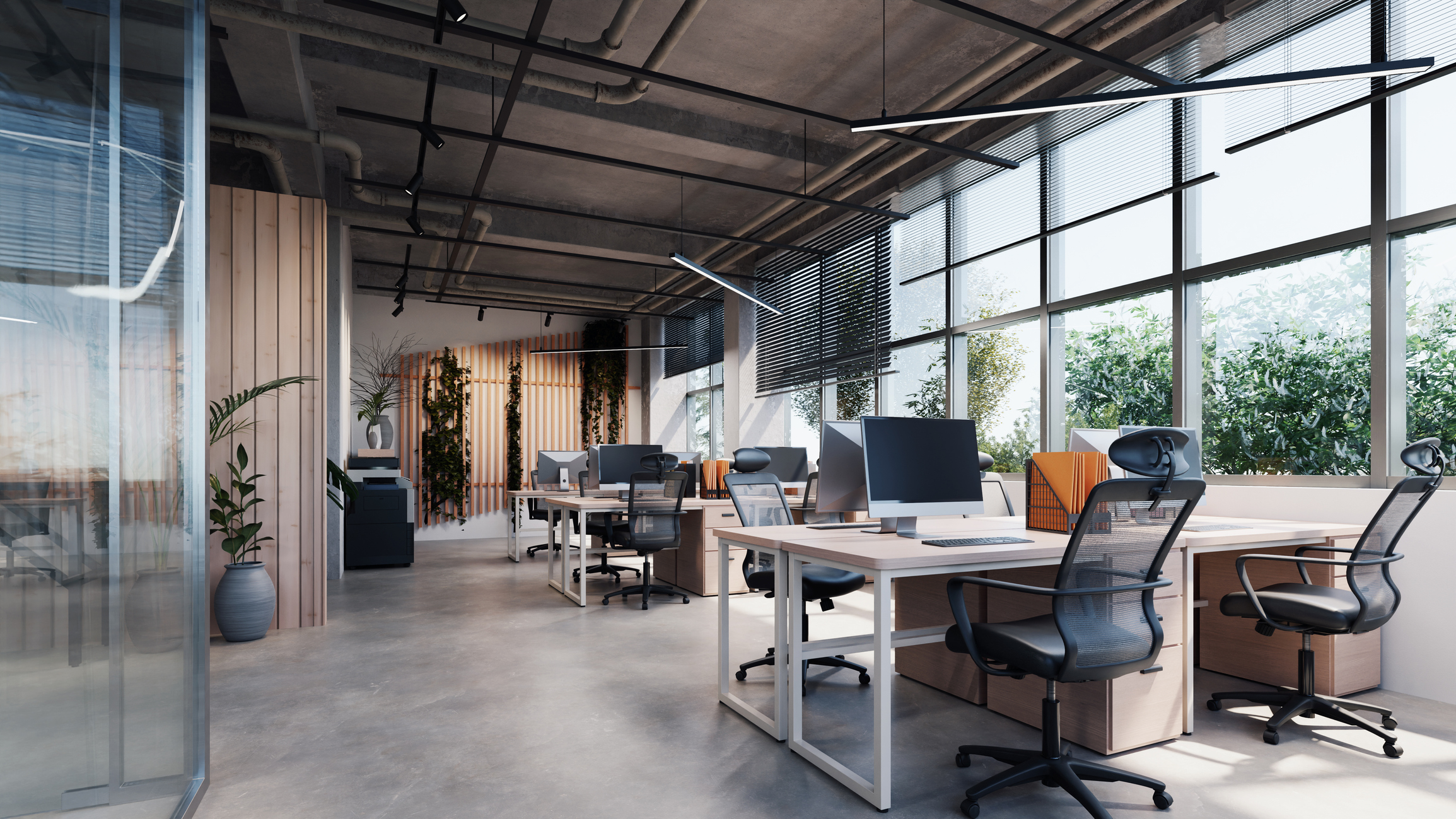 modern style office with exposed concrete floor and a lot of plants
