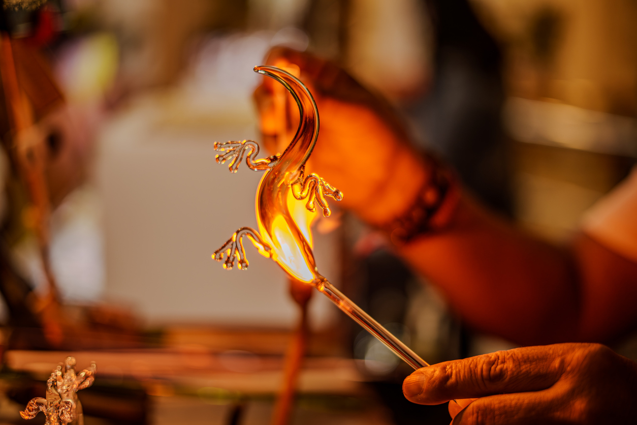 glassblowing, glass, lizard, figurine, art, craft, artisan, handmade, creation, fire, torch, heat, workshop, skill, detail, molten, hot, orange, flame, craftsmanship, glass art, glass maker, glass studio, glass figure, animal, reptile, gecko, salamander,