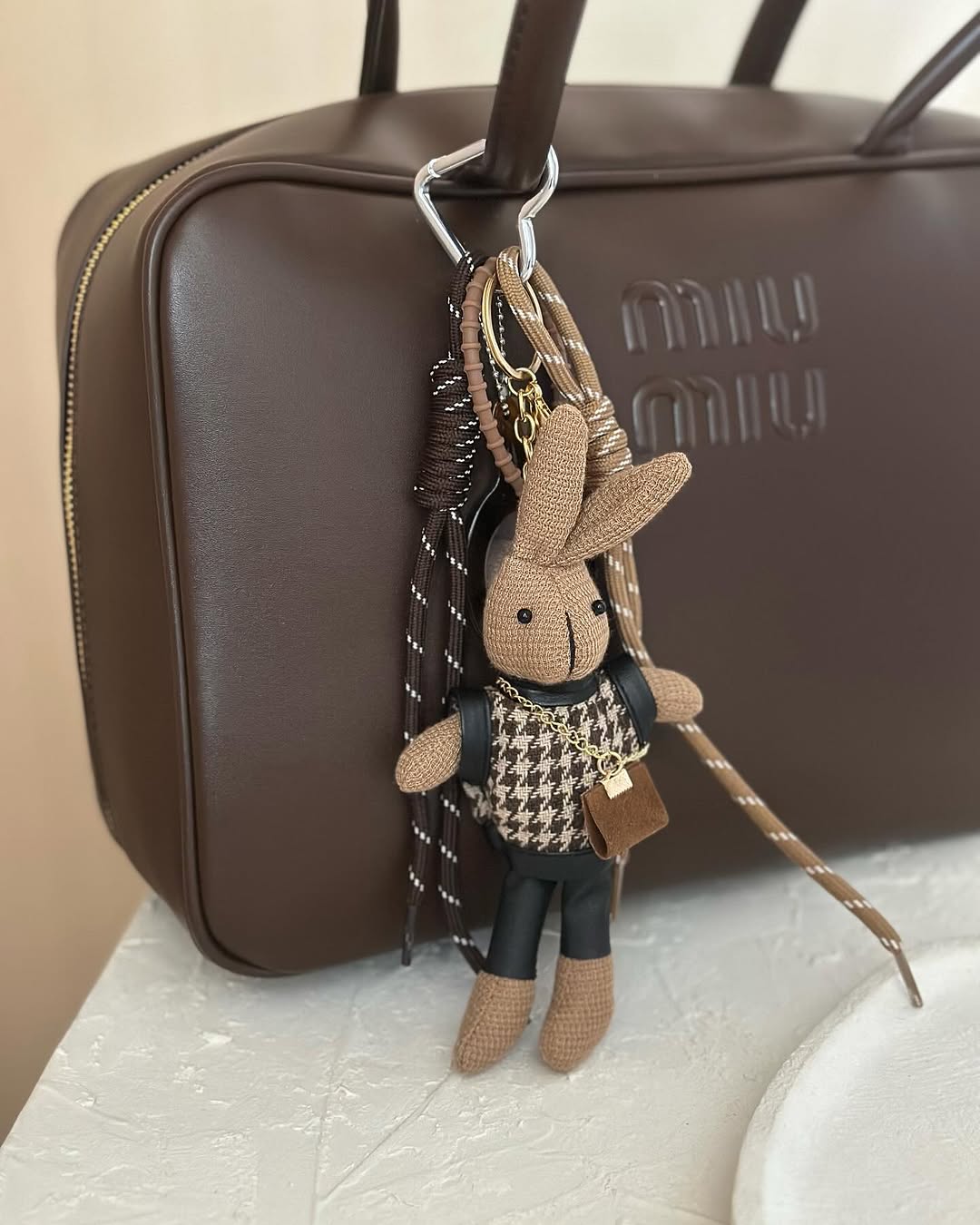 Coach, Gucci, Prada and Swarovski styles