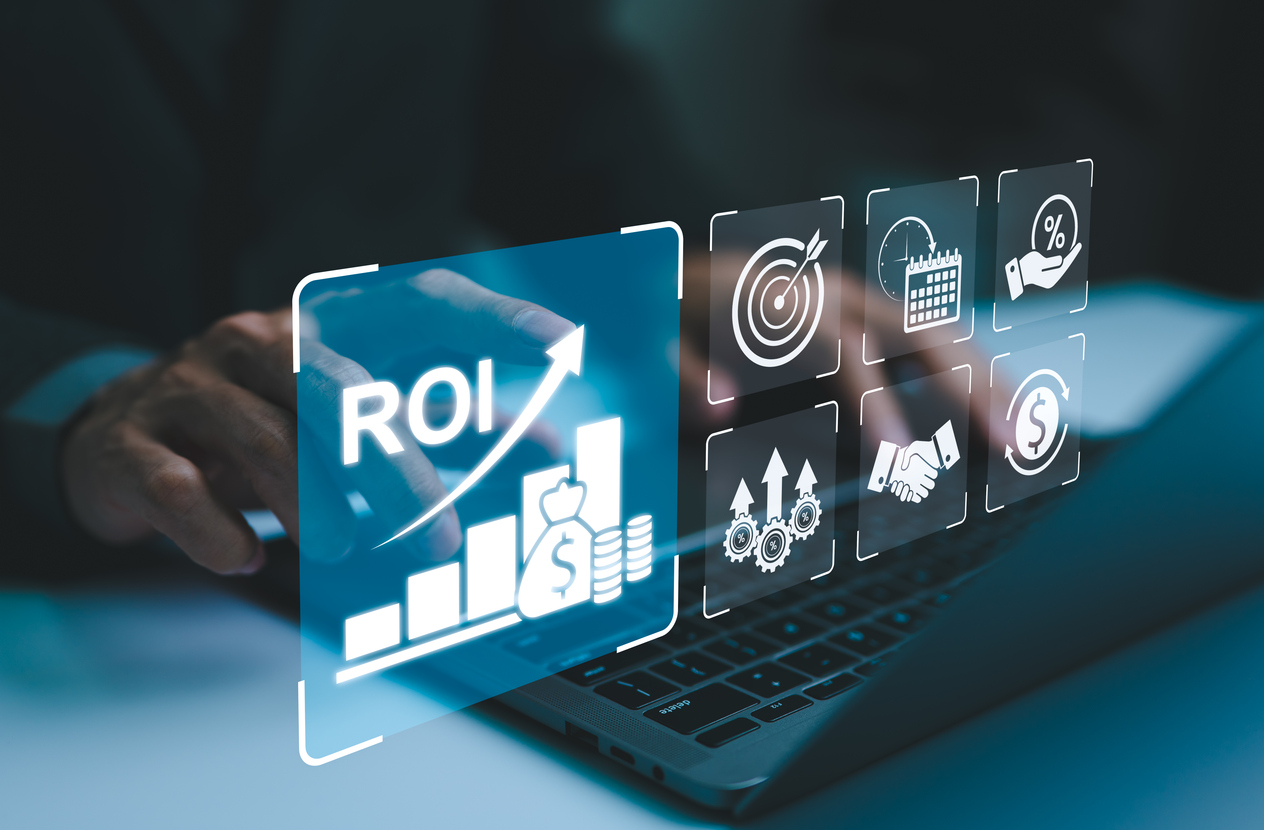 analyzing roi and business strategy concepts. businessman working on a laptop with various digital icons representing roi, financial strategies, return on investment, and efficiency. marketing plan,