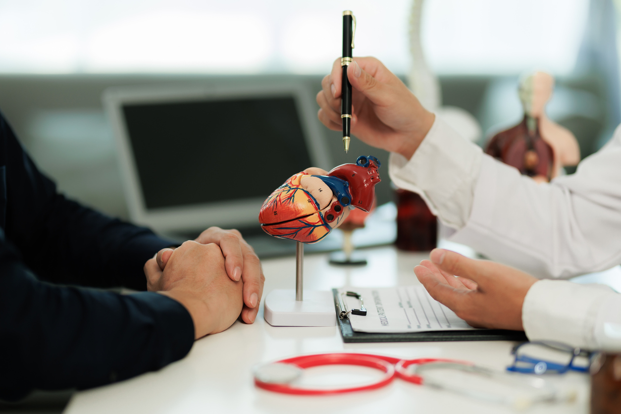 patient with heart pain consulting a specialist to identify the cause and receive treatment guidance.