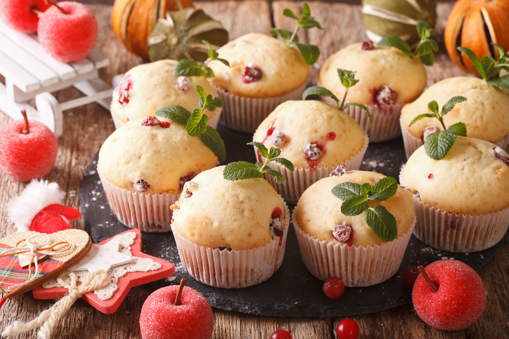 cranberry muffins with christmas decorations close up. horizontal