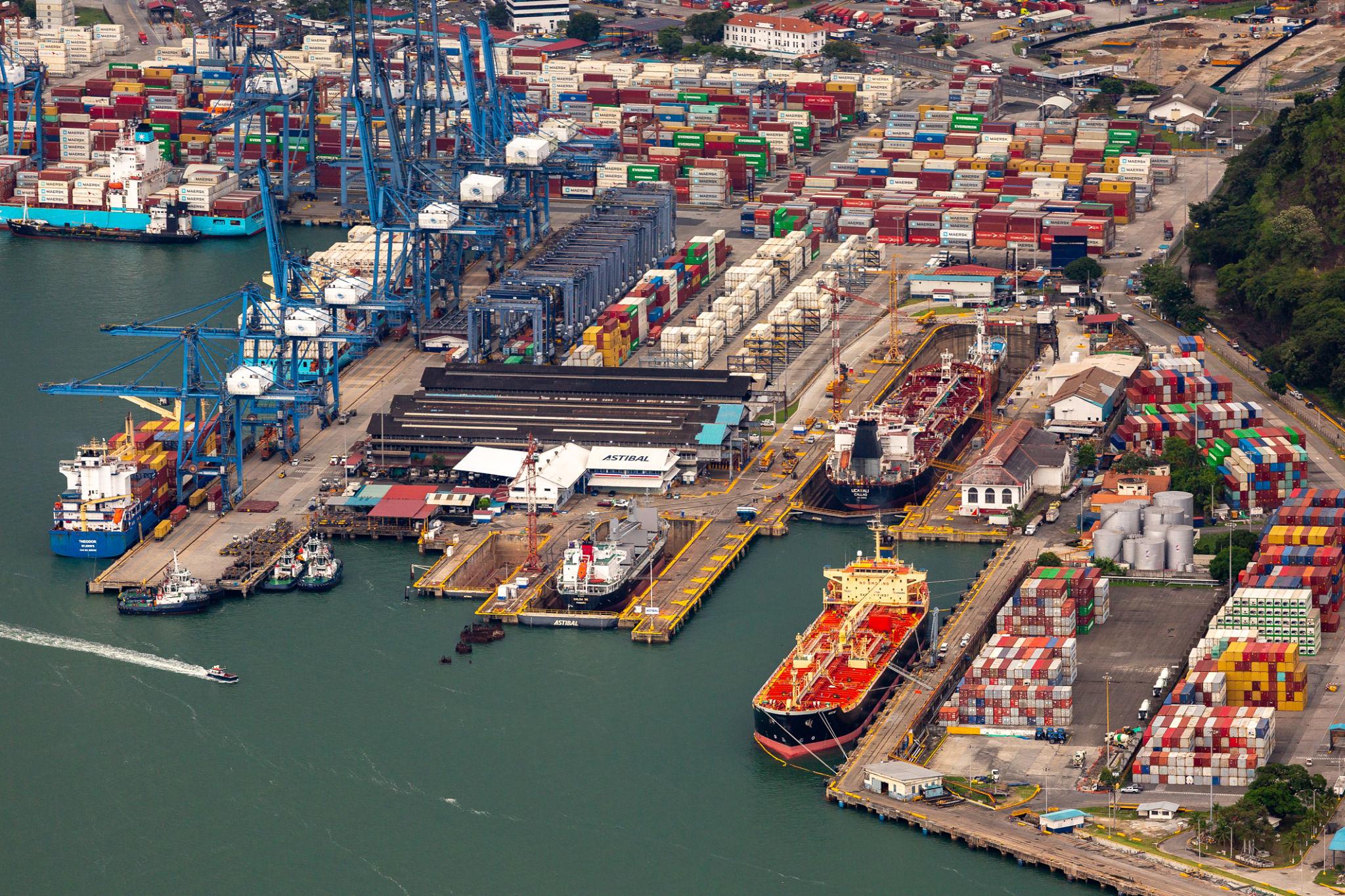 Container ships docked at a Panama Canal port as court action throws long-standing port contracts into uncertainty.