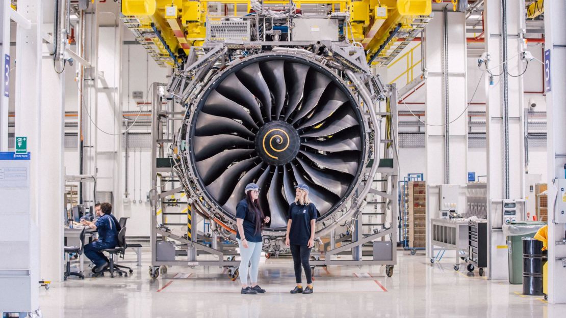 Rolls-Royce jet engine undergoing inspection inside a manufacturing and maintenance facility