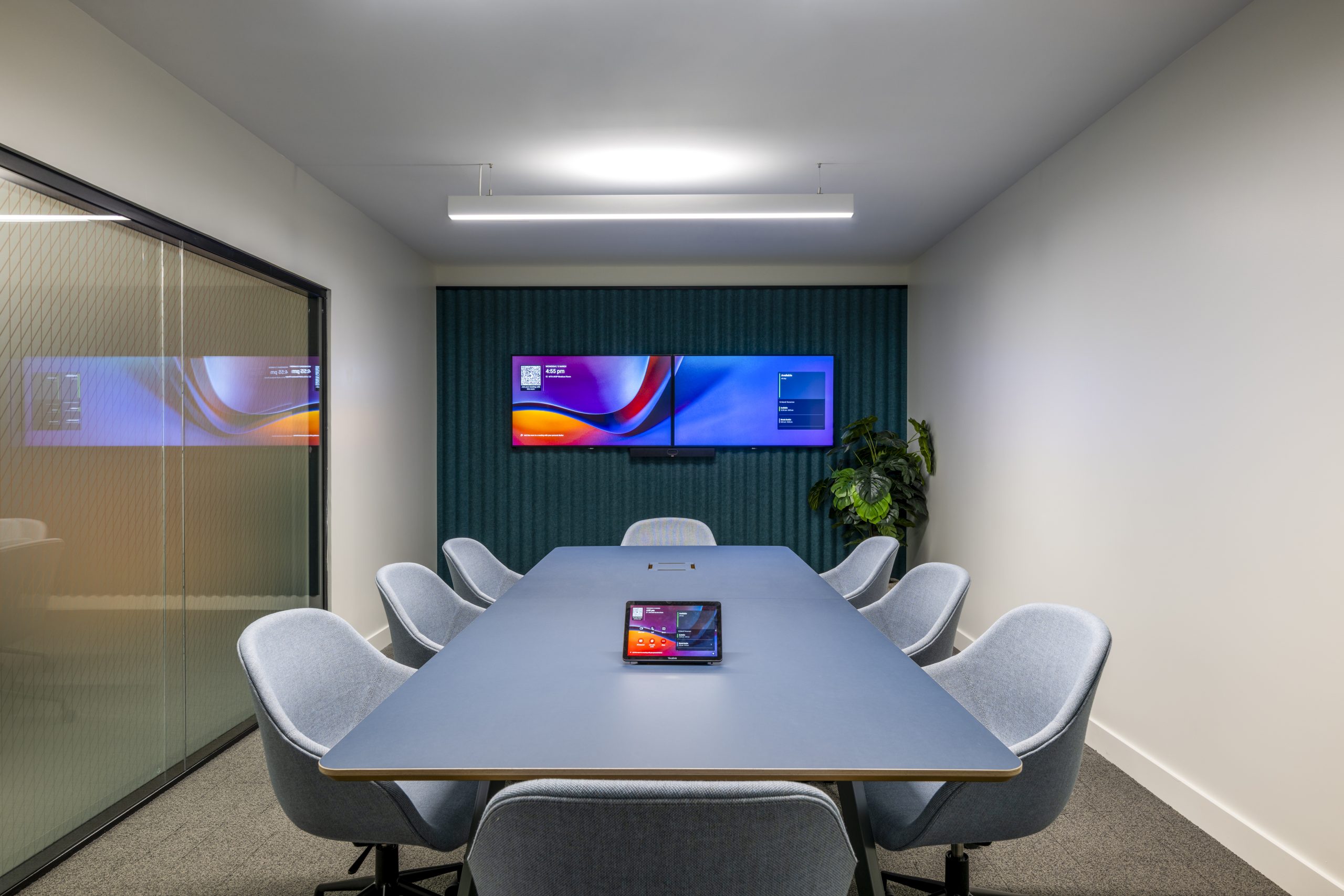 Corporate boardroom reviewing capital and workforce strategy documents