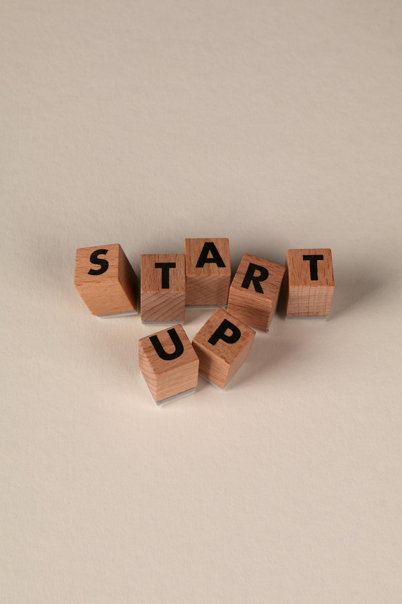 Wooden Blocks Spelling Start-Up Concept