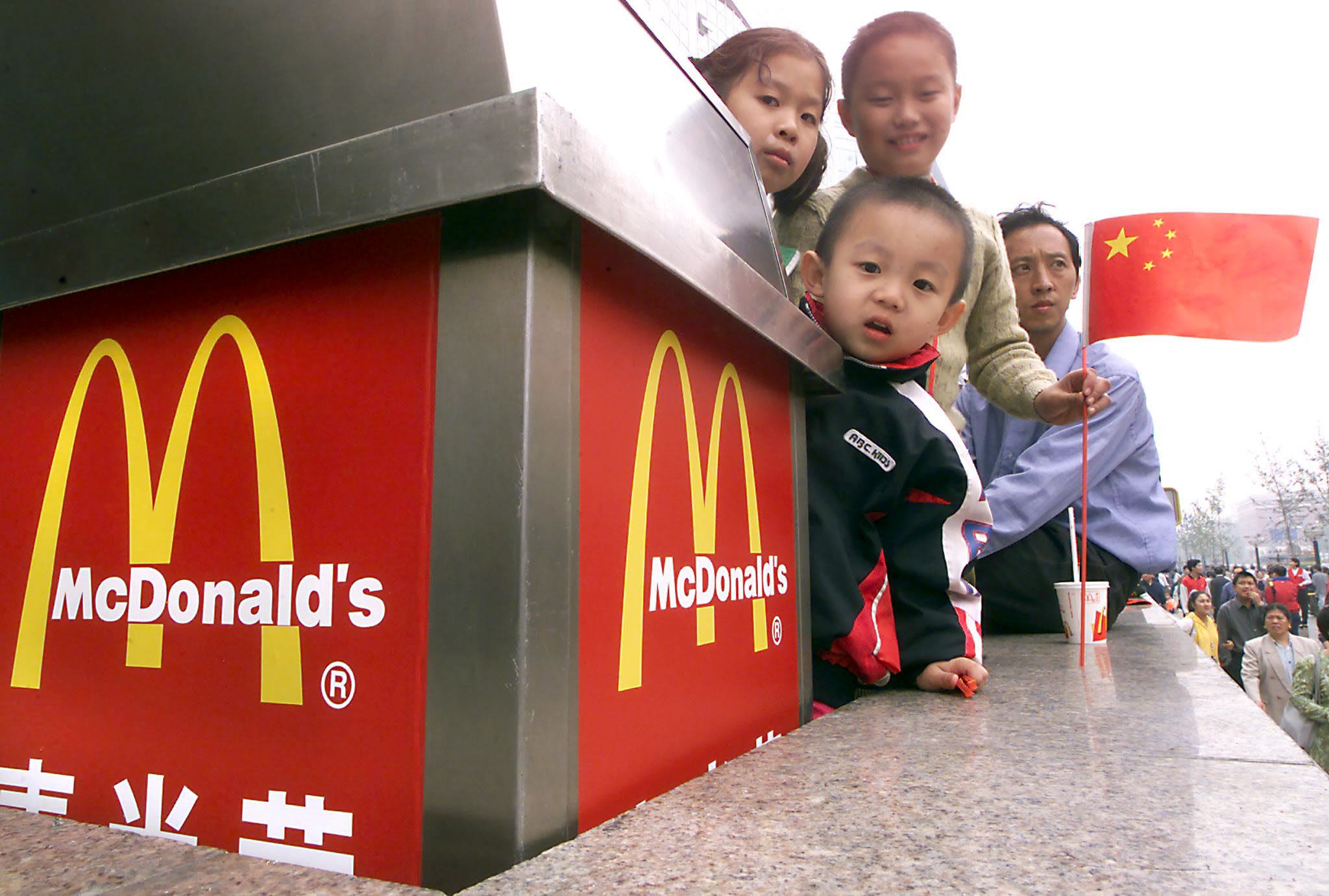 Customers at a McDonald&rsquo;s in China, highlighting fast food expansion into smaller Chinese cities